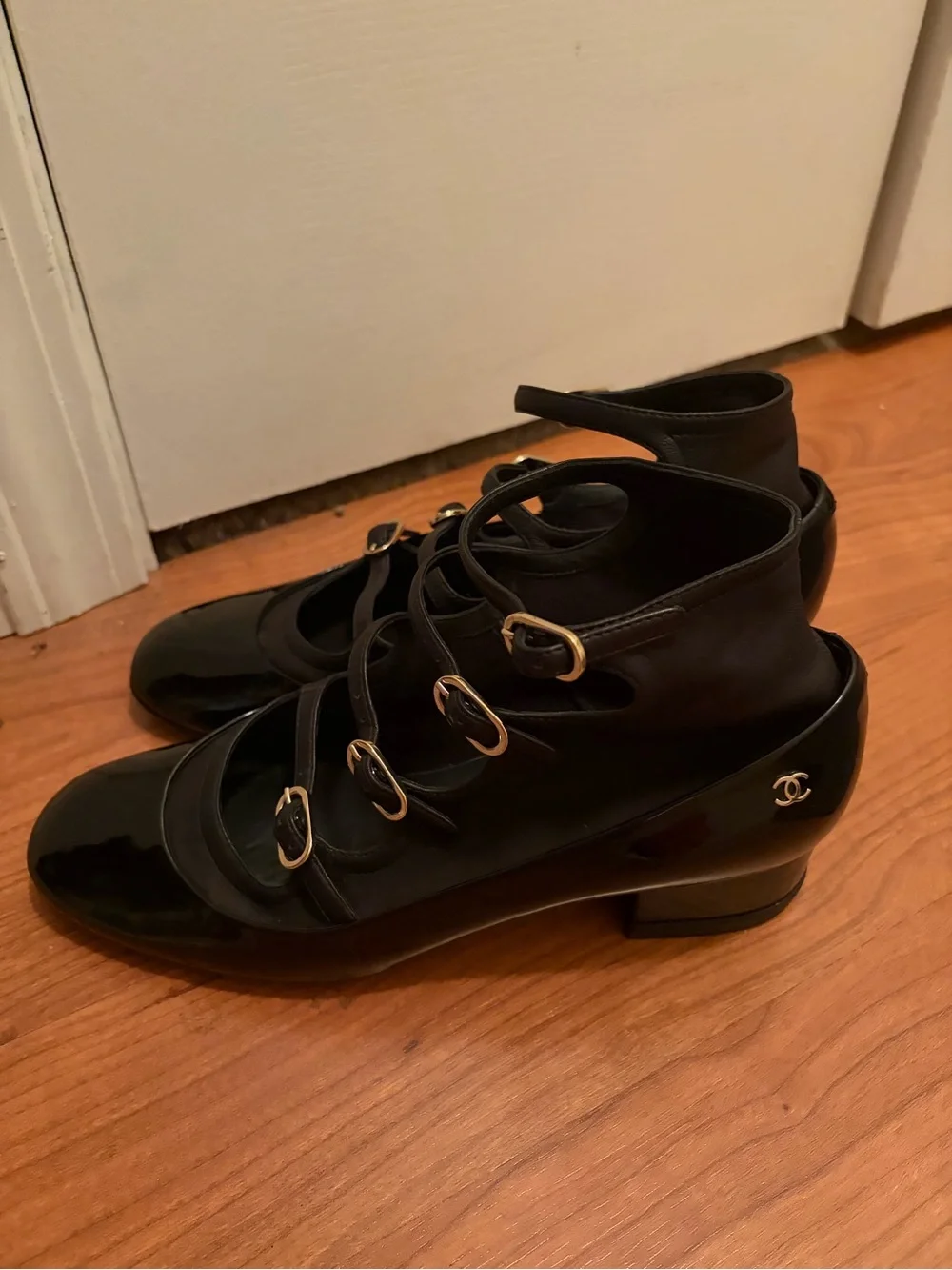 Authentic Chanel Mary Jane Pumps in excellent pre-owned condition.